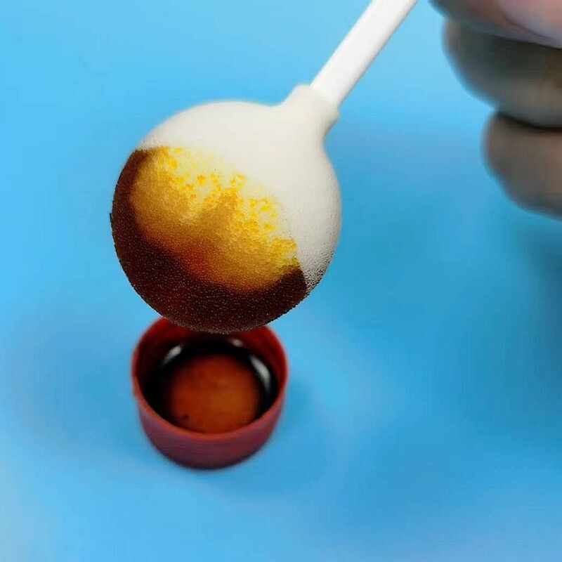 Spugna per la pulizia delle ferite ad alta capacità di fluido: manico da 105 mm con testa rotonda grande per una gestione efficiente dell'essudato